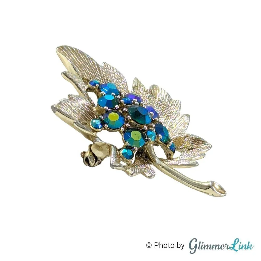 Vintage Blue Aurora Borealis Rhinestone Leaf Gold Tone Textured Brooch